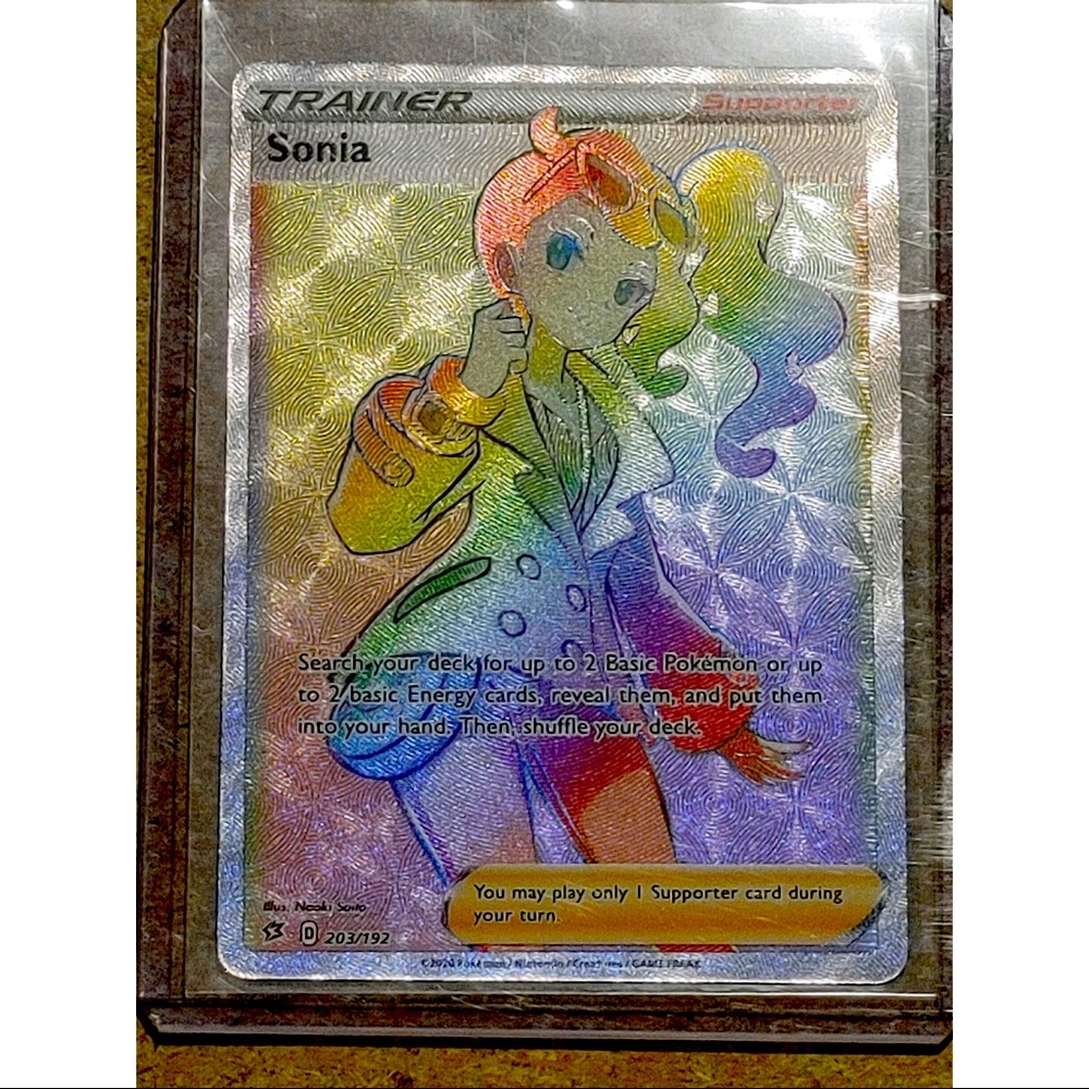 Sonia 203/192 Secret Rare mint pulled from booster Pokémon